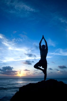 health coach posing at sunset